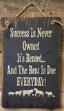 Success Is Never Owned Antique Sign