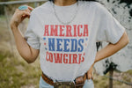 America Needs Cowgirls Tee