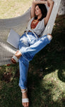 Distressed Women’s Mid Rise Flare Jeans